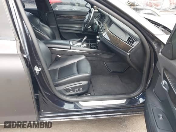 2013 BMW 7 Series 750i xDrive with VIN WBAYB6C50DD223674, listed as a IAAI auction lot 43391475 with 96,553 mi miles and . Bid and sale history available at DreamBid. Image 5.