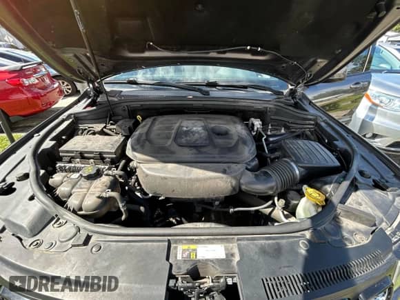 2017 Jeep Grand Cherokee Altitude with VIN 1C4RJFAG2HC905952, listed as a Copart auction lot 86542135 with 135,013 mi miles and Clean title. Bid and sale history available at DreamBid. Image 7.