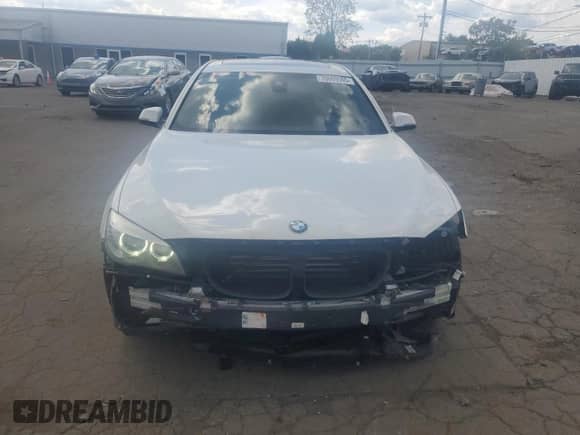 2013 BMW 7 Series 750Li xDrive with VIN WBAYF8C54DDE59165, listed as a Copart auction lot 70009505 with 230,903 mi miles and Salvage title. Bid and sale history available at DreamBid. Image 5.