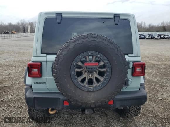 2023 Jeep Wrangler Rubicon 20th Anniversary with VIN 1C4JJXSJ5PW686723, listed as a Copart auction lot 51116935 with 16,041 mi miles and Salvage title. Bid and sale history available at DreamBid. Image 6.