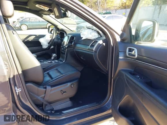 2021 Jeep Grand Cherokee 80th Anniversary with VIN 1C4RJFBG5MC737412, listed as a IAAI auction lot 41753550 with 54,921 mi miles and . Bid and sale history available at DreamBid. Image 5.