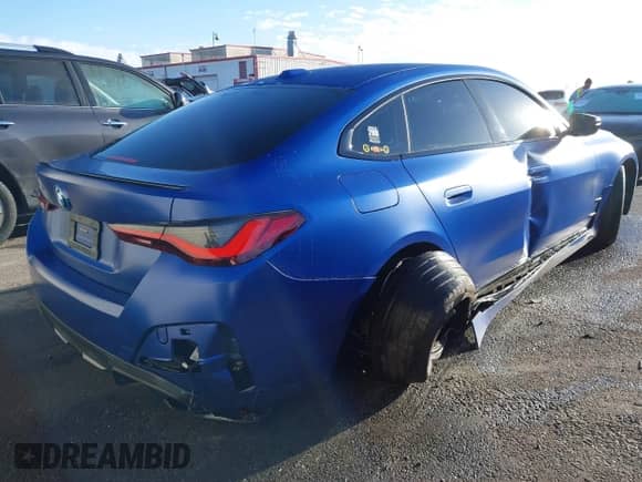 2024 BMW i4 eDrive40 with VIN WBY73AW07RFS43770, listed as a IAAI auction lot 41689504 with 14,684 mi miles and . Bid and sale history available at DreamBid. Image 4.