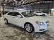 2012 Chevrolet Malibu LTZ 1LZ with VIN 1G1ZE5E09CF168390, listed as a Copart auction lot 84930215 with 154,381 mi miles and Salvage title. Bid and sale history available at DreamBid. Image 4.