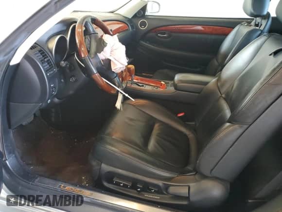 2004 Lexus SC 430 z VIN JTHFN48Y640056624, wystawiony jako Copart lot #71527975 z przebiegiem 111 582 mil mil oraz Szkoda całkowita • Salvage title. Historia ofert i sprzedaży dostępna na DreamBid. Obrazek 7.