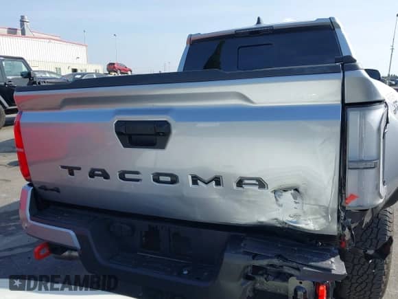 2024 Toyota Tacoma SR5 with VIN 3TMLB5JN6RM022612, listed as a IAAI auction lot 41611378 with 7,275 mi miles and . Bid and sale history available at DreamBid. Image 17.