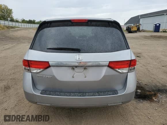 2016 Honda Odyssey LX with VIN 5FNRL5H26GB103453, listed as a Copart auction lot 86080625 with 97,833 mi miles and Salvage title. Bid and sale history available at DreamBid. Image 6.