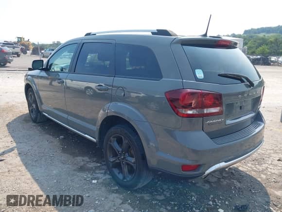 2019 Dodge Journey Crossroad with VIN 3C4PDCGGXKT809955, listed as a IAAI auction lot 42929763 with 81,769 mi miles and . Bid and sale history available at DreamBid. Image 3.