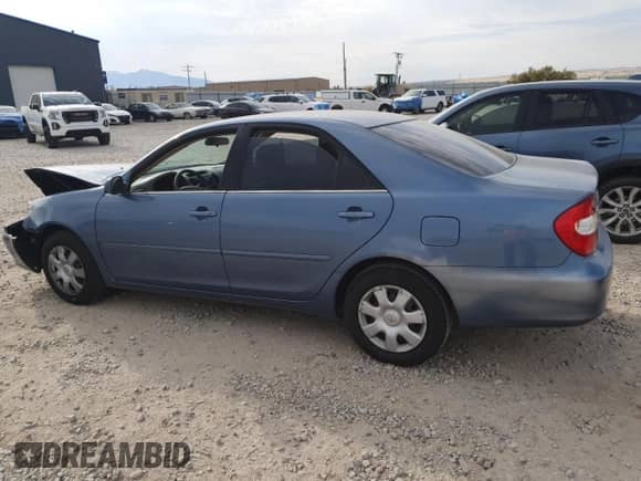 2004 Toyota Camry LE with VIN 4T1BE32K84U791690, listed as a Copart auction lot 70896055 with 170,324 mi miles and Salvage title. Bid and sale history available at DreamBid. Image 2.