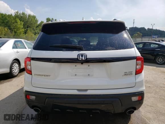 2021 Honda Passport Elite с VIN 5FNYF8H0XMB032322, выставлен на аукционе Copart как лот 68850165 с пробегом 19 751 миль миль и На запчасти • Non repairable. История ставок и продаж доступна на DreamBid. Изображение 6.