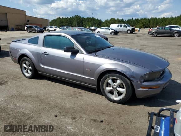 2007 Ford Mustang Deluxe z VIN 1ZVFT80N675302933, wystawiony jako Copart lot #80001295 z przebiegiem 240 096 mil mil oraz Szkoda całkowita • Salvage title. Historia ofert i sprzedaży dostępna na DreamBid. Obrazek 4.