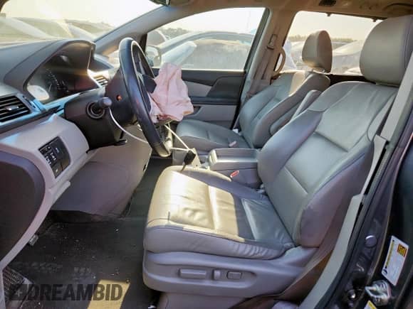 2013 Honda Odyssey EX-L z VIN 5FNRL5H66DB023178, wystawiony jako Copart lot #71291035 z przebiegiem 200 364 mil mil oraz Szkoda całkowita • Salvage title. Historia ofert i sprzedaży dostępna na DreamBid. Obrazek 7.