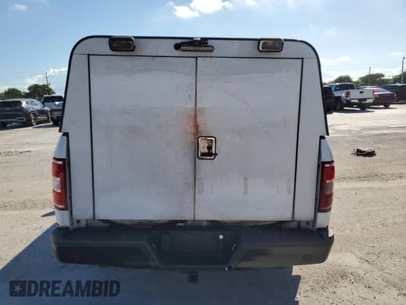 2018 Ford F-150 XL с VIN 1FTEX1CB5JKF29566, выставлен на аукционе Copart как лот 81484665 с пробегом 100 808 миль миль и Списание • Salvage title. История ставок и продаж доступна на DreamBid. Изображение 6.