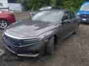 2022 Honda Accord EX-L z VIN 1HGCV1F56NA006721, wystawiony jako IAAI lot #43030981 z przebiegiem 102 894 mil mil oraz . Historia ofert i sprzedaży dostępna na DreamBid. Obrazek 18.