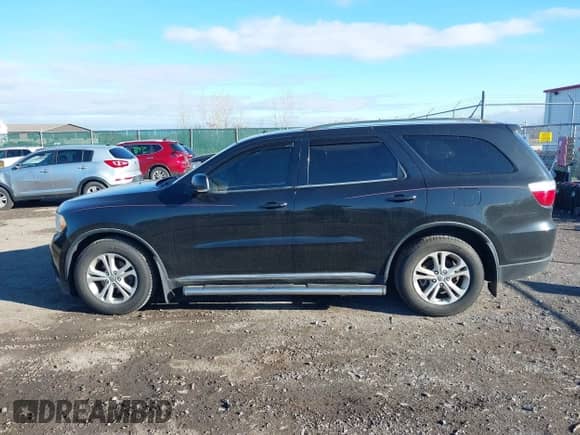 2011 Dodge Durango Crew z VIN 1D4RE4GG5BC599694, wystawiony jako IAAI lot #43531802 z przebiegiem 146 445 mil mil oraz . Historia ofert i sprzedaży dostępna na DreamBid. Obrazek 14.