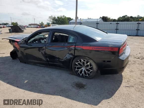 2013 Dodge Charger SE с VIN 2C3CDXBG0DH554990, выставлен на аукционе Copart как лот 67819975 с пробегом 164 226 миль миль и Списание • Salvage title. История ставок и продаж доступна на DreamBid. Изображение 2.