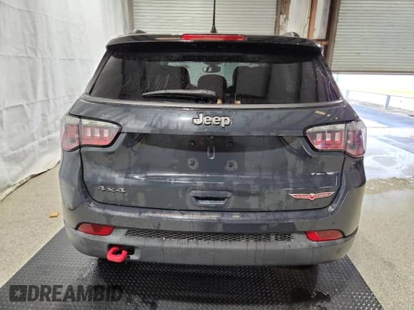 2018 Jeep Compass Trailhawk with VIN 3C4NJDDB8JT264061, listed as a Copart auction lot 68252765 with 69,347 mi miles and Clean title. Bid and sale history available at DreamBid. Image 6.