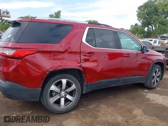 2018 Chevrolet Traverse LT with VIN 1GNERHKW1JJ116144, listed as a IAAI auction lot 43212606 with 121,318 mi miles and . Bid and sale history available at DreamBid. Image 13.