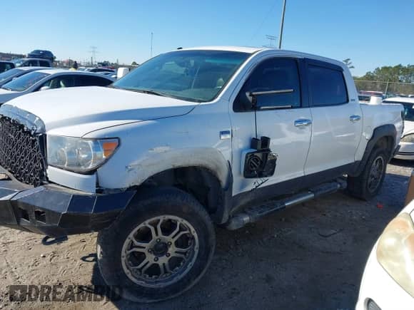 2013 Toyota Tundra Limited с VIN 5TFHW5F12DX312459, выставлен на аукционе IAAI как лот 41303176 с пробегом 289 393 миль миль и . История ставок и продаж доступна на DreamBid. Изображение 2.