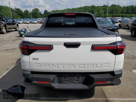 2022 Hyundai Santa Cruz SEL с VIN 5NTJC4AE8NH023549, выставлен на аукционе Copart как лот 65622975 с пробегом 55 859 миль миль и Списание • Salvage title. История ставок и продаж доступна на DreamBid. Изображение 6.