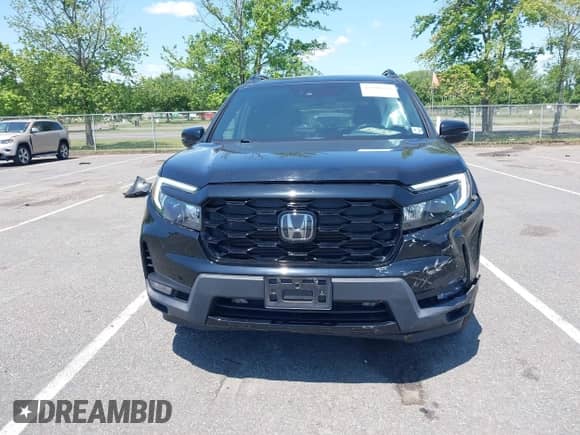 2022 Honda Passport Elite with VIN 5FNYF8H00NB004126, listed as a IAAI auction lot 42401773 with 32,012 mi miles and . Bid and sale history available at DreamBid. Image 12.