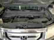 2009 Honda Pilot LX with VIN 5FNYF38219B009703, listed as a Copart auction lot 86054625 with 215,143 mi miles and Clean title. Bid and sale history available at DreamBid. Image 12.