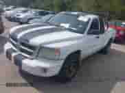 2008 Dodge Dakota SLT with VIN 1D3HE42K38S595704, listed as a IAAI auction lot 43455232 with 317,071 mi miles and . Bid and sale history available at DreamBid. Image 2.