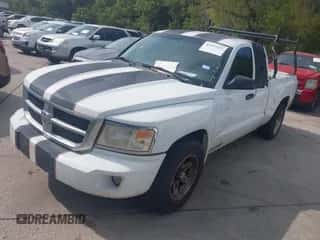 2008 Dodge Dakota SLT with VIN 1D3HE42K38S595704, listed as a IAAI auction lot 43455232 with 317,071 mi miles and . Bid and sale history available at DreamBid. Image 2.