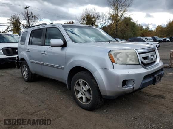 2010 Honda Pilot Touring с VIN 5FNYF4H9XAB021792, выставлен на аукционе Copart как лот 89511745 с пробегом 233 599 миль миль и Списание • Salvage title. История ставок и продаж доступна на DreamBid. Изображение 4.