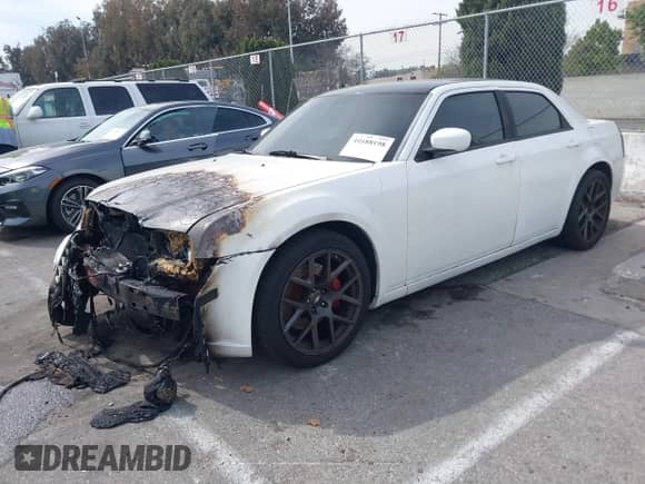 2007 Chrysler 300 C SRT-8 with VIN 2C3LA73W17H659735, listed as a IAAI auction lot 41688198 with 132,785 mi miles and . Bid and sale history available at DreamBid. Image 17.