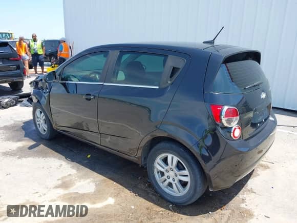 2014 Chevrolet Sonic LT with VIN 1G1JC6SH0E4208843, listed as a IAAI auction lot 42767630 with 124,697 mi miles and . Bid and sale history available at DreamBid. Image 3.