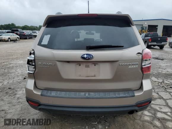 2014 Subaru Forester Touring with VIN JF2SJAMC8EH500918, listed as a Copart auction lot 70511065 with 118,054 mi miles and Salvage title. Bid and sale history available at DreamBid. Image 6.