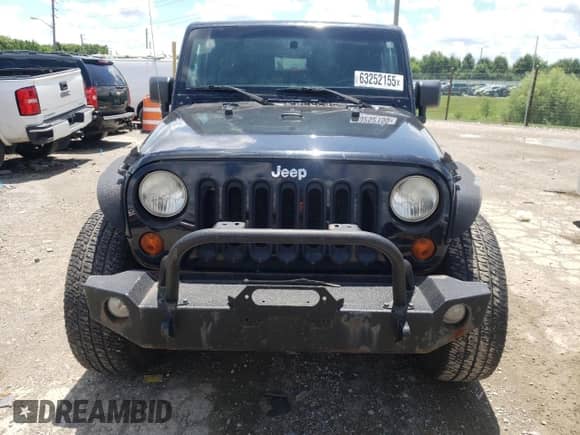 2011 Jeep Wrangler Sahara с VIN 1J4AA5D11BL528191, выставлен на аукционе Copart как лот 63252155 с пробегом 171 169 миль миль и Чистый • Clean title. История ставок и продаж доступна на DreamBid. Изображение 5.