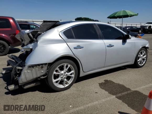2014 Nissan Maxima SV with VIN 1N4AA5AP7EC454011, listed as a Copart auction lot 69620855 with 143,879 mi miles and Salvage title. Bid and sale history available at DreamBid. Image 3.