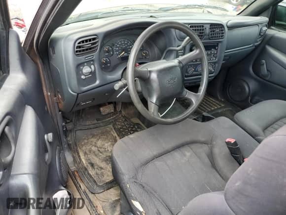2003 Chevrolet S-10 с VIN 1GCCS19H738285498, выставлен на аукционе Copart как лот 66815274 с пробегом 148 809 миль миль и Списание • Salvage title. История ставок и продаж доступна на DreamBid. Изображение 8.