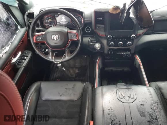 2019 Ram 1500 Rebel z VIN 1C6RRELT7KN724233, wystawiony jako Copart lot #86823514 z przebiegiem 96 464 mil mil oraz Czysty tytuł • Clean title. Historia ofert i sprzedaży dostępna na DreamBid. Obrazek 8.