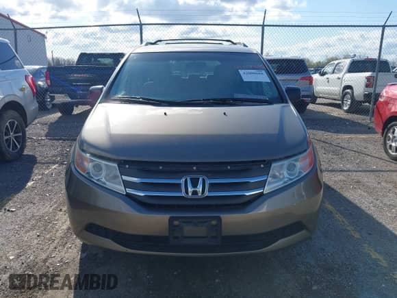 2012 Honda Odyssey LX z VIN 5FNRL5H29CB091860, wystawiony jako IAAI lot #42000688 z przebiegiem 295 551 mil mil oraz . Historia ofert i sprzedaży dostępna na DreamBid. Obrazek 12.