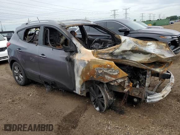 2015 Hyundai Tucson Limited z VIN KM8JUCAG5FU000417, wystawiony jako Copart lot #61836685 z przebiegiem Nie podano mil oraz Szkoda całkowita • Salvage title. Historia ofert i sprzedaży dostępna na DreamBid. Obrazek 4.
