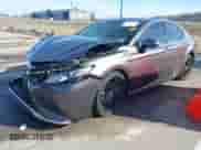 2021 Toyota Camry Hybrid XSE with VIN 4T1K31AK2MU023604, listed as a IAAI auction lot 41476057 with 26,211 mi miles and . Bid and sale history available at DreamBid. Image 2.