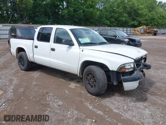 2002 Dodge Dakota with VIN 1B7HL38ZX2S625110, listed as a IAAI auction lot 42511915 with 262,217 mi miles and . Bid and sale history available at DreamBid. Image 1.