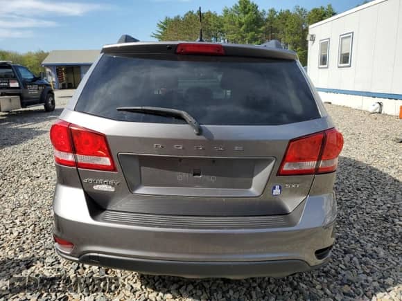 2013 Dodge Journey SXT with VIN 3C4PDCBB9DT722370, listed as a Copart auction lot 57086485 with 135,423 mi miles and Salvage title. Bid and sale history available at DreamBid. Image 6.