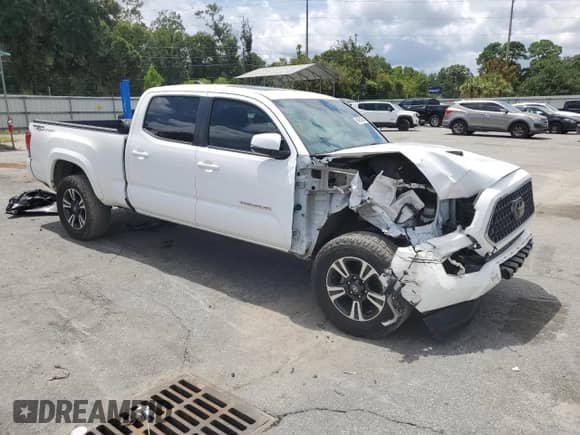 2018 Toyota Tacoma SR5 с VIN 3TMBZ5DN3JM016239, выставлен на аукционе Copart как лот 68904385 с пробегом 77 131 миль миль и Списание • Salvage title. История ставок и продаж доступна на DreamBid. Изображение 4.