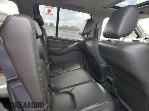 2011 Nissan Pathfinder Silver z VIN 5N1AR1NB5BC634542, wystawiony jako Copart lot #44106205 z przebiegiem 105 421 mil mil oraz Szkoda całkowita • Salvage title. Historia ofert i sprzedaży dostępna na DreamBid. Obrazek 11.