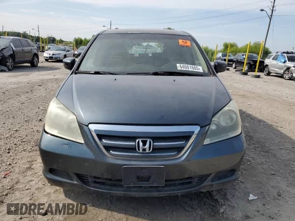 2006 Honda Odyssey EX z VIN 5FNRL38416B437734, wystawiony jako Copart lot #64601665 z przebiegiem 235 453 mil mil oraz Szkoda całkowita • Salvage title. Historia ofert i sprzedaży dostępna na DreamBid. Obrazek 5.