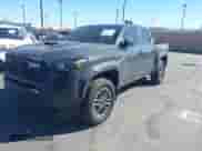 2024 Toyota Tacoma SR5 with VIN 3TMLB5JN5RM051339, listed as a IAAI auction lot 41241754 with 7,181 mi miles and . Bid and sale history available at DreamBid. Image 2.