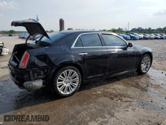 2014 Chrysler 300 C John Varvatos Luxury Edition с VIN 2C3CCADG9EH180913, выставлен на аукционе Copart как лот 62553235 с пробегом 189 610 миль миль и Списание • Salvage title. История ставок и продаж доступна на DreamBid. Изображение 3.