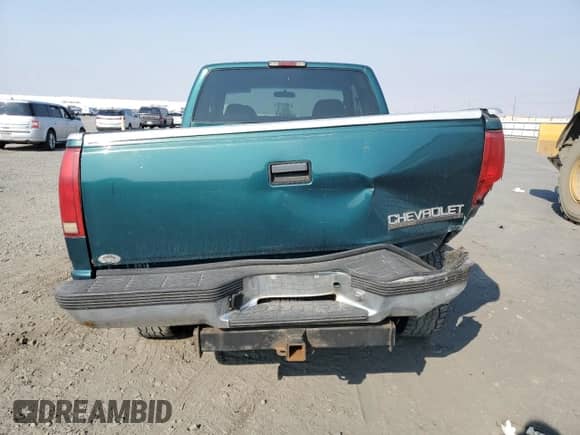 1998 Chevrolet Silverado 1500 with VIN 2GCEK19RXW1116889, listed as a Copart auction lot 70948515 with 238,720 mi miles and Salvage title. Bid and sale history available at DreamBid. Image 6.