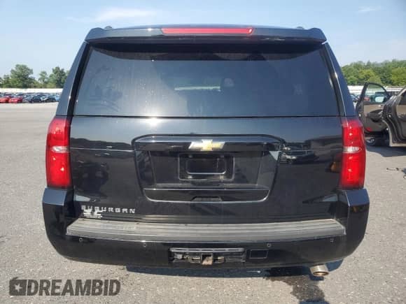 2019 Chevrolet Suburban LT with VIN 1GNSKHKCXKR157646, listed as a Copart auction lot 66486525 with 136,121 mi miles and Salvage title. Bid and sale history available at DreamBid. Image 6.