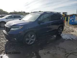 2019 Honda Passport Touring with VIN 5FNYF8H91KB013489, listed as a Copart auction lot 81443725 with 135,828 mi miles and Salvage title. Bid and sale history available at DreamBid. Image 1.