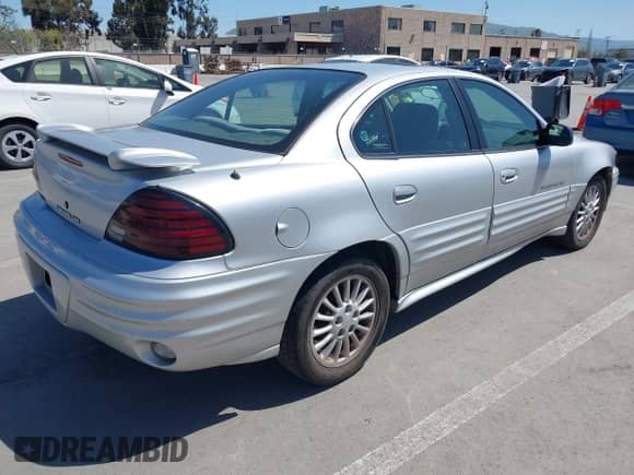 2001 Pontiac Grand Am SE1 z VIN 1G2NF52T81M550988, wystawiony jako IAAI lot #41959887 z przebiegiem 212 819 mil mil oraz . Historia ofert i sprzedaży dostępna na DreamBid. Obrazek 4.