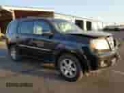 2010 Honda Pilot Touring with VIN 5FNYF4H87AB038749, listed as a Copart auction lot 69882305 with 141,496 mi miles and Salvage title. Bid and sale history available at DreamBid. Image 4.